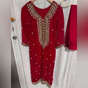 3 piece red shalwar kameez.